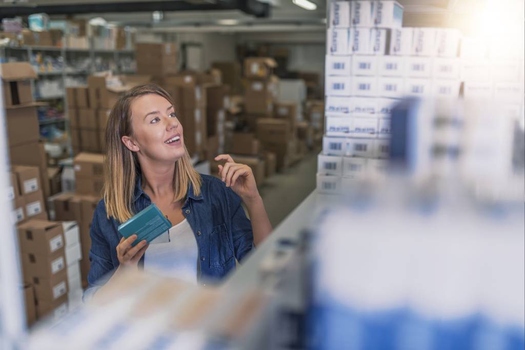 Woman sourcing inventory from wholesaler